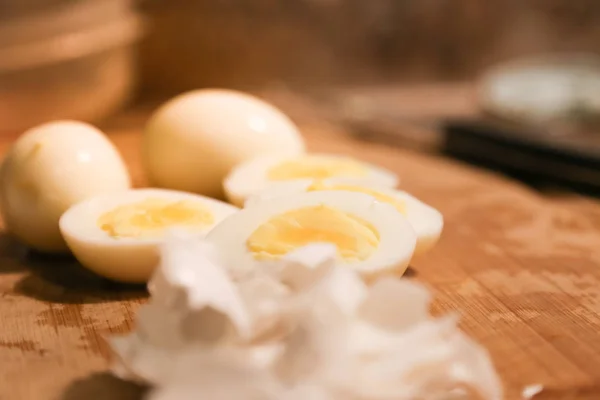 Hard boiled eggs on a chopping board