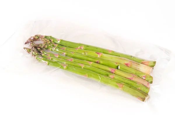 Verse Groene Asperges Vacuüm Witte Achtergrond — Stockfoto