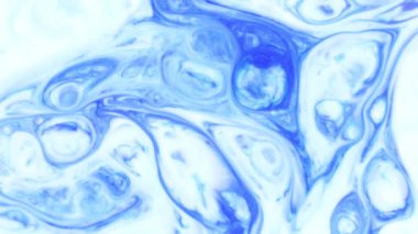 Soyut Renkli Boya Mürekkebi Patlaması Psikedelik Patlama Hareketi. yumuşak renkler, soyut kompozisyon. Mavi mermer zemin ile akrilik dokusu 