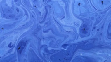 Soyut Renkli Boya Mürekkebi Patlaması Psikedelik Patlama Hareketi. yumuşak renkler, soyut kompozisyon. Mavi mermer zemin ile akrilik dokusu 