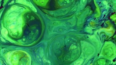 Soyut Renkli Boya Mürekkebi Patlaması Psikedelik Patlama Hareketi. yumuşak renkler, soyut kompozisyon. Yeşil mermer zemin ile akrilik dokusu 