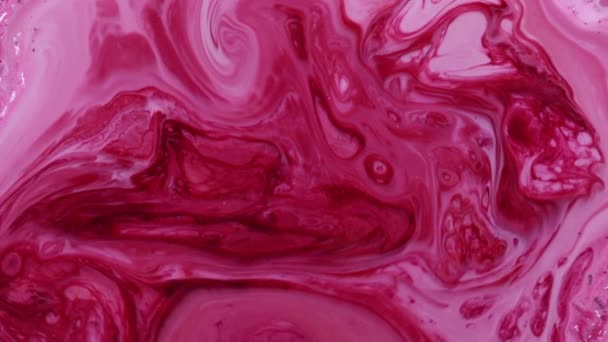 色彩斑斓的油漆水墨爆炸扩散心理爆破运动 柔和的颜色 抽象的构图 红宝石背景的丙烯酸质感 — 图库视频影像