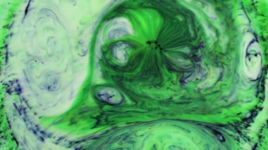 Soyut Renkli Boya Mürekkebi Patlaması Psikedelik Patlama Hareketi. yumuşak renkler, soyut kompozisyon. Yeşil mermer zemin ile akrilik dokusu 