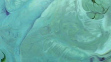 Soyut Renkli Boya Mürekkebi Patlaması Psikedelik Patlama Hareketi. yumuşak renkler, soyut kompozisyon. Yeşil mermer zemin ile akrilik dokusu 