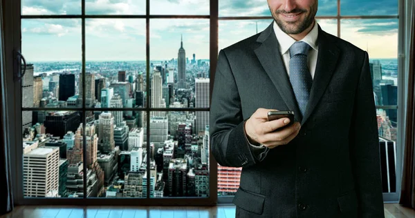 successful man near the window of a tall building with stunning views writes on a hypothetical background the word Success and an arrow comes alive on the rise with marketing info graphic