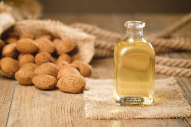 Badem yağı kompozisyon kozmetik, spa, sağlık merkezleri kullanılan. Mükemmel vücut yağı ve nemlendirici cilt. Kavramı: Güzellik, yağlar, kremler, sağlık.