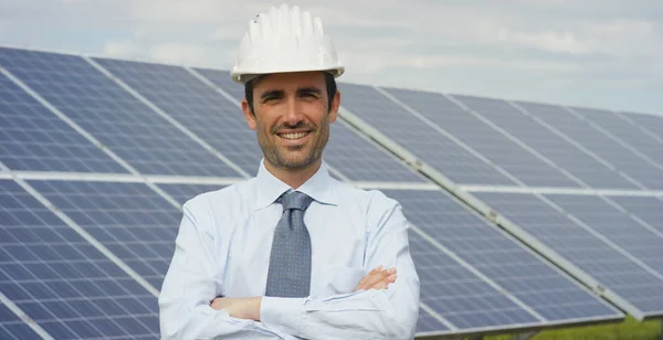 Business Man Helmet Standing Eco Solar Panels Arms Crossed Looking — Stock Photo, Image