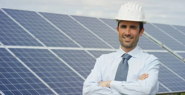 Business Man Helmet Standing Eco Solar Panels Arms Crossed Looking — Stock Photo, Image