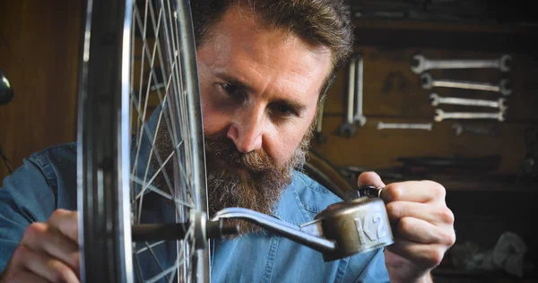 Well Groomed Handsome Bearded Master Hipster Specialist Bicycles Repairing Bicycle — Stock Photo, Image