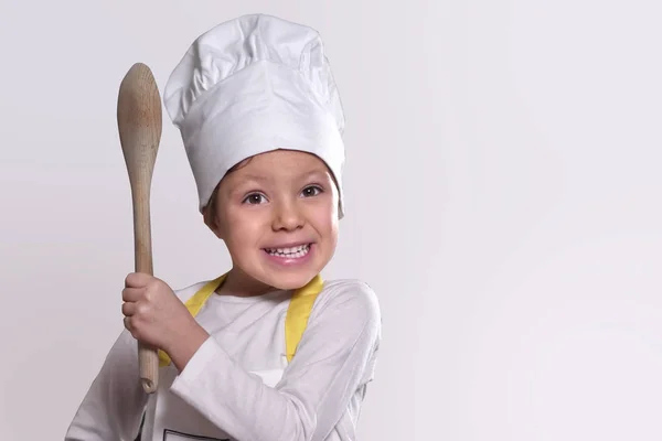 Retrato Una Niña Cocina Vestida Como Una Cocinera Profesional Sonriendo —  Fotos de Stock