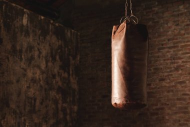 dangling brown boxing bag clipart