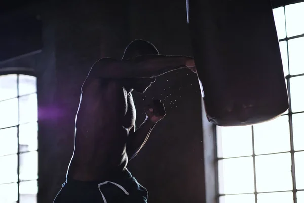 Handsome Shirtless Muscular African Man Boxing Punching Bag — Stock Photo, Image