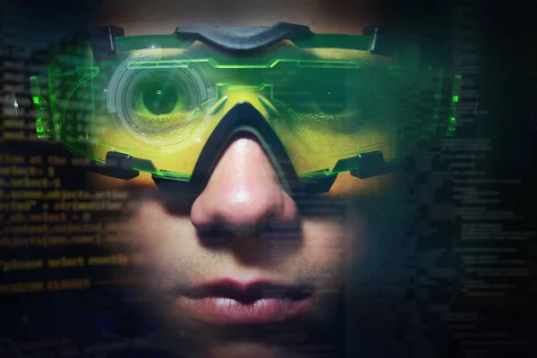 一个男孩的肖像与绿色眼镜从真正的专业游戏玩家和图形背景的全息 网络游戏 — 图库照片