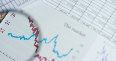 iş kağıtları ve Büyüteç Camı evrak Pazar grafik ile video 
