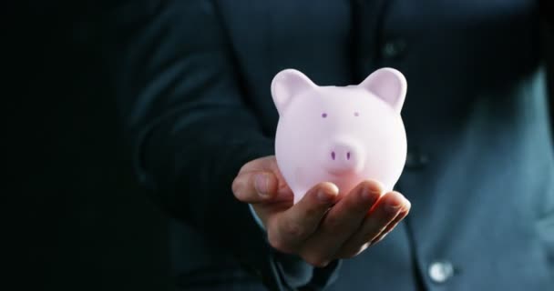 Man Dressed Suit Tie Puts Money Piggy Bank Concept Pension — Stock Video