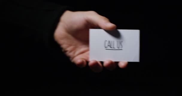 Video Partial View Hand Showing Small Paper Card Message Call — Stock Video