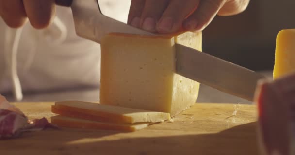 Composition Italian Cheese Wooden Cutting Board One Hand Takes Knife — Stock Video