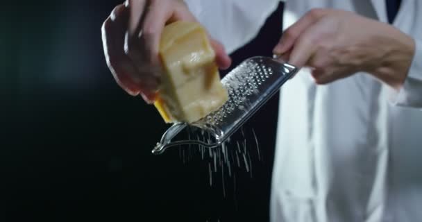 Video Chef Grating Parmesan Cheese — Stock Video