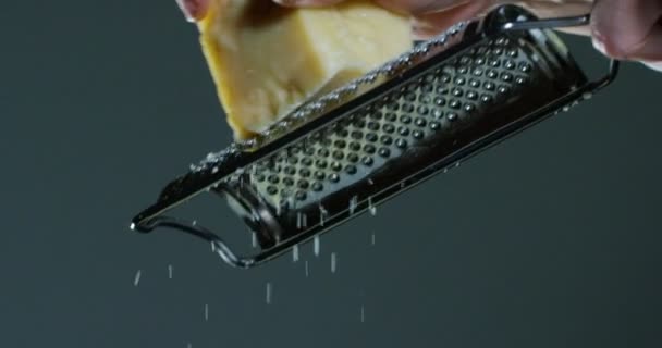 Slow Motion Video Chef Grating Parmesan Cheese — Stock Video