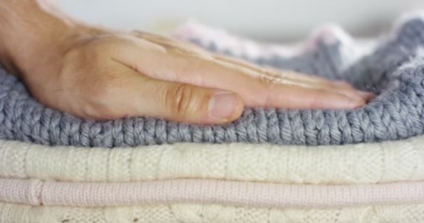 Partial View Child Hand Touching Knitted Sweaters Slow Motion Video — Stock Video