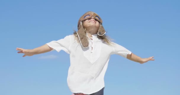Happy Baby Sky Blue Sky Plays Aviator Arms Open Smiling — Stock Video
