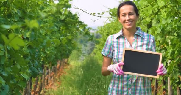 Slow Motion Video Farmer Woman Standing Grape Field Plantation Holding — Stock Video