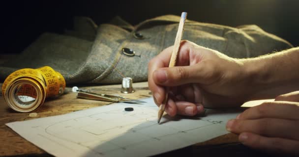 Slow Motion Hand Young Tailor Who Draws Pencil His Study — Stock Video