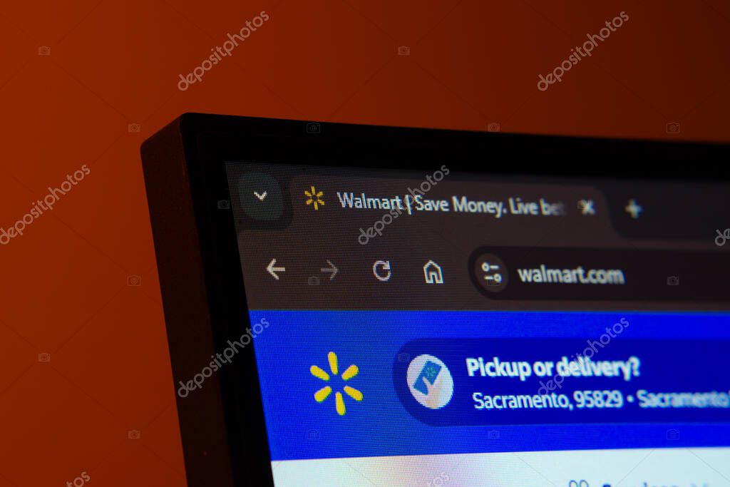 Dhaka, Bangladesh- 02 June 2025: Close-up of a computer screen displaying the Walmart web interface in dark mode