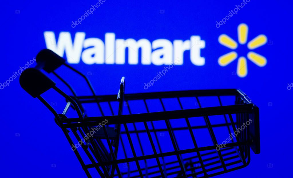 Dhaka, Bangladesh- 03 July 2025: Silhouette of a shopping cart in front of the Walmart logo, symbolizing ecommerce and online shopping