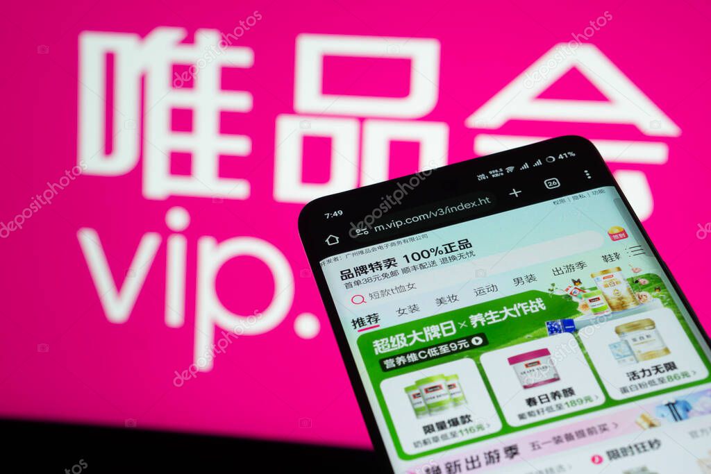 Dhaka, Bangladesh- 03 July 2025: Smartphone displaying vip.com web interface against vip.com logo background.