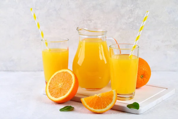 Glass Cups Pitcher Fresh Orange Juice Slices Orange Yellow Tubes — Stock Photo, Image