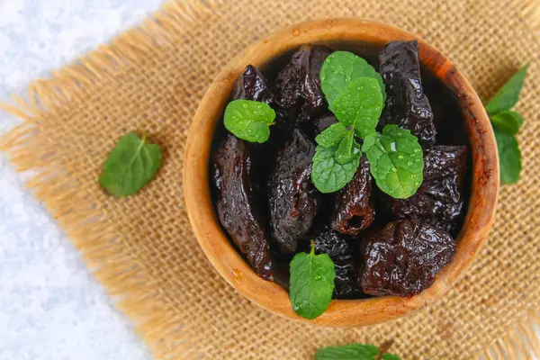 Prunes Fresh Mint Leaves Bowl Concrete Table Stock Image