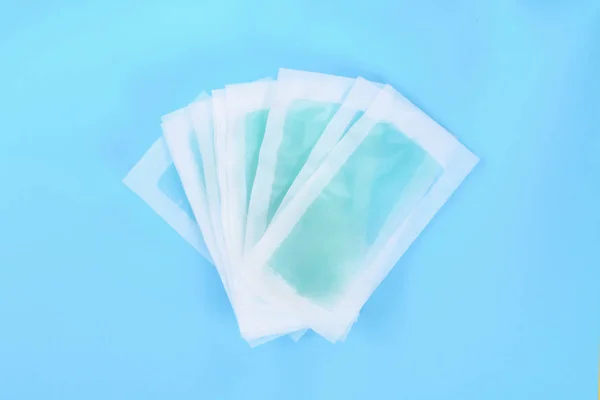 Blue Waxing Strips Blue Pastel Background Top View — Stock Photo, Image