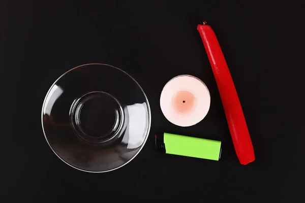 Diy Halloween Halloween white candle covered in red wax like blood drops on black background