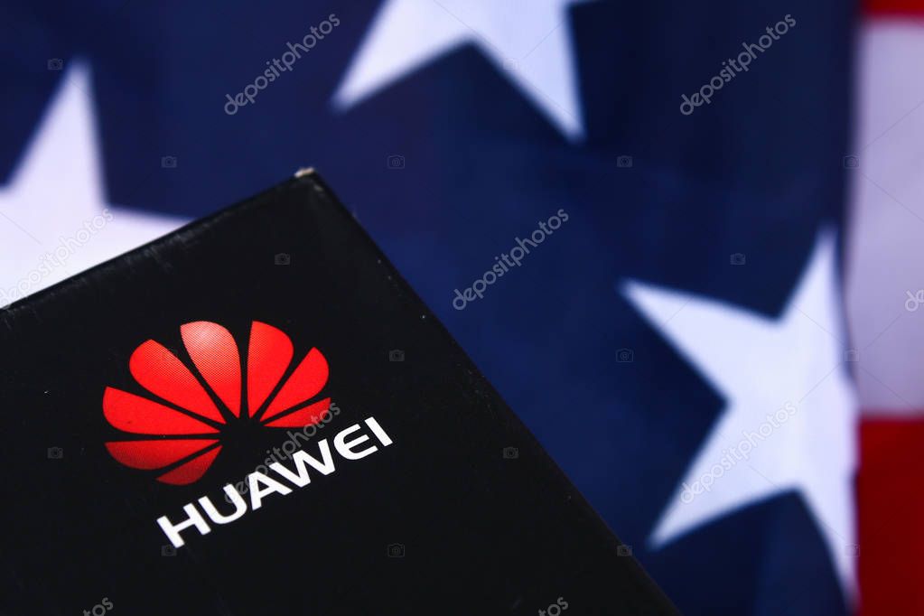 Mobile phone company Huawei on background of flag and USA dollars. The confrontation of countries US-China. Business. Stavropol, June 2019