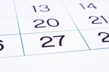 Takvim sayfası kapatın. Büyük sayılar. Takvim sayfası arka planı. Sayı 27