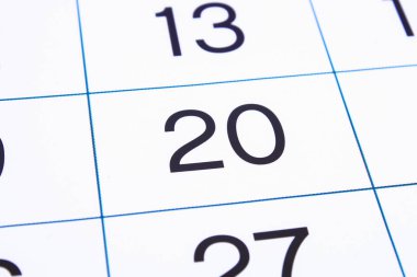 Takvim sayfası yakın yukarı. Büyük sayılar. Takvim sayfası arka planı. 20 numara