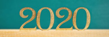Mutlu Yıllar 2020. Yaratıcı metin Happy New Year 2020 altın ahşap harflerle yazılmıştır. Afiş.
