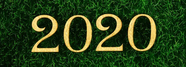Gelukkig Nieuwjaar 2020. Creatieve tekst gelukkig Nieuwjaar 2020 geschreven in gouden houten letters. Banner. — Stockfoto