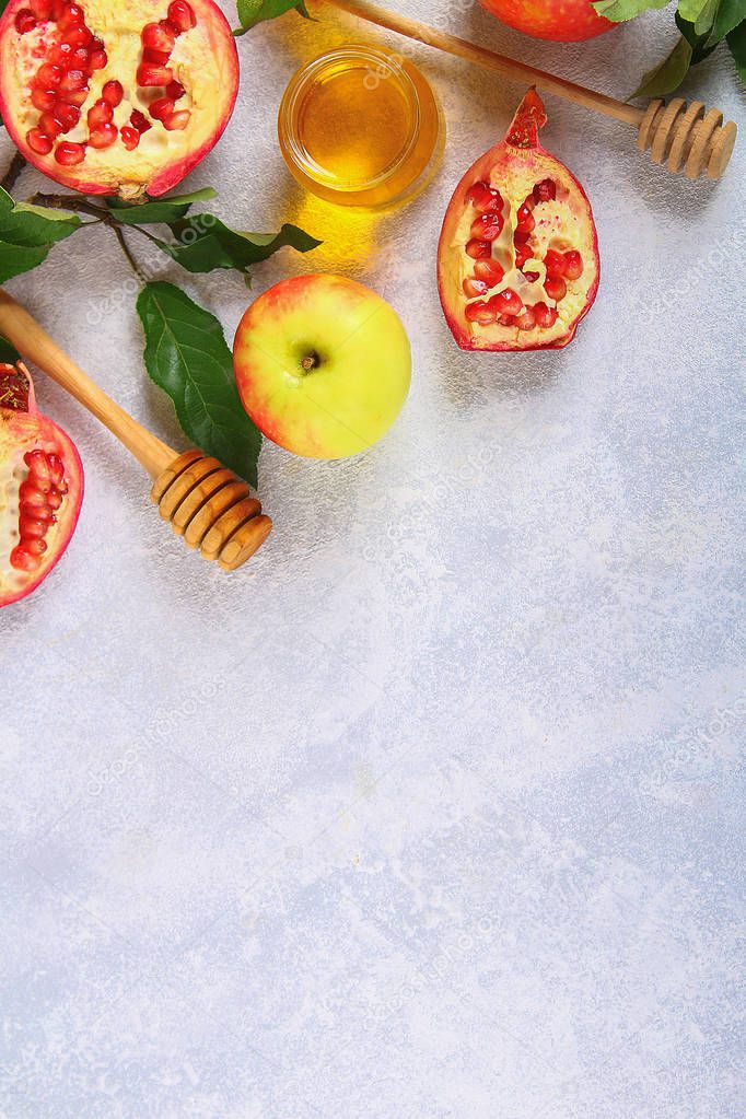 Rosh hashanah jewish New Year holiday concept. Traditional symbol. Apples, honey, pomegranate