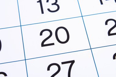 Takvim sayfası yakın yukarı. Büyük sayılar. Takvim sayfası arka planı. 20 numara