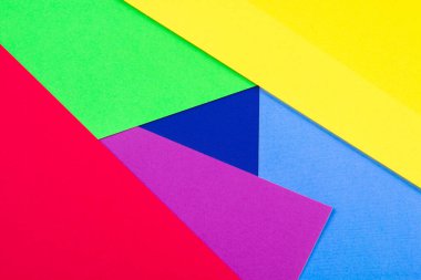 Geometrik renkli kağıt. Parlak renkli kağıt dokusu arka planı. Eğilim renkleri, geometrik kağıt arkaplanı. Yumuşak kağıt arkaplan rengi.