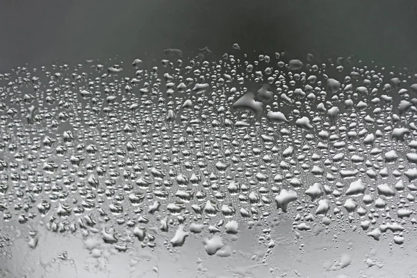Condensación en el primer plano de vidrio gotas de agua de doble acristalamiento — Foto de Stock