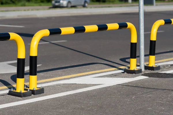 Car parking safety Bollard Guard black yellow steel pipe — Zdjęcie stockowe