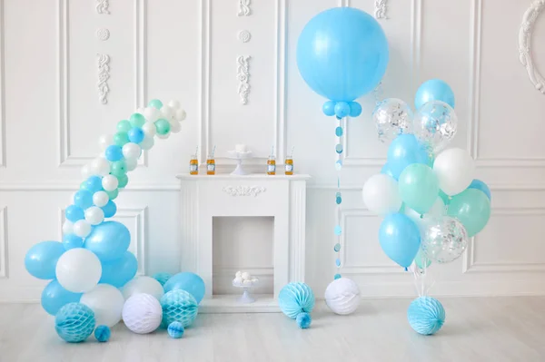 Decorations for birthday party. A lot of balloons. Decorations for holiday party. Cakes and drinks for holiday party.