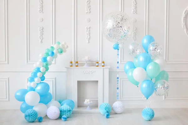 Decorations for birthday party. A lot of balloons. Decorations for holiday party. Cakes and drinks for holiday party.
