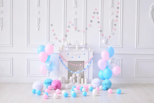 Birthday decorations ideas. Decorations for holiday party. A lot of balloons. Balloons blue and pink colors.
