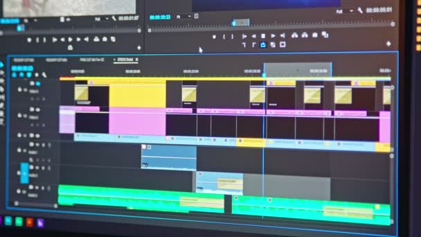Video editing timeline - editor going through clips and frames — Stock Video