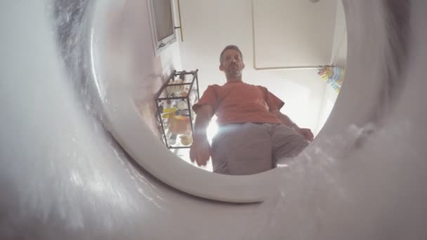 A view from inside the toilet with water flushing down — Stock Video