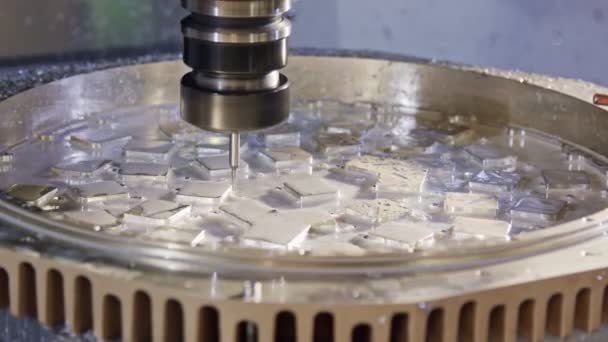 Machining process - high precision CNC mill manufacturing an advanced metal part — Stock Video